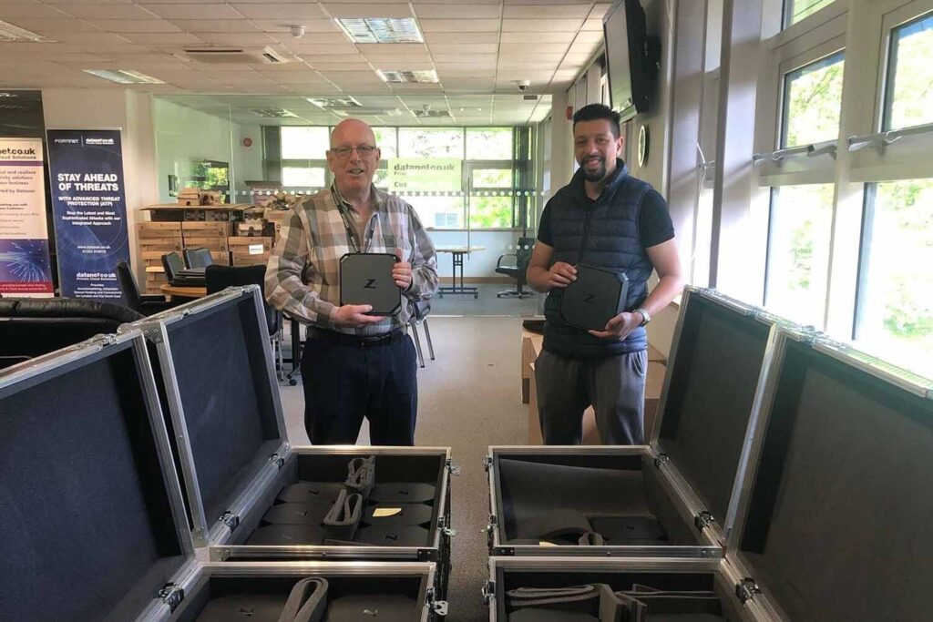 datanet staff and client unpacking flight storage case and into the data centre for the rack move